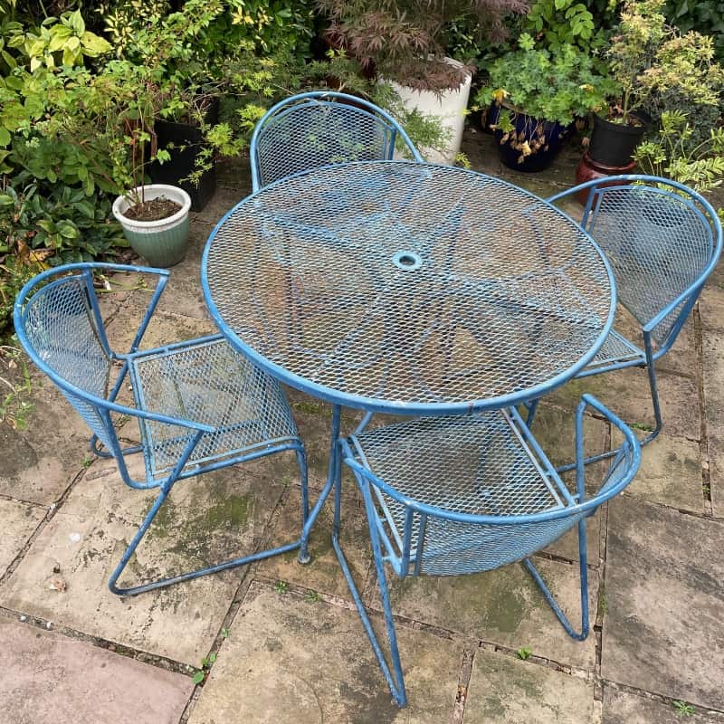  Metal And Mesh Garden Set comprising of a round table and four chairs,  