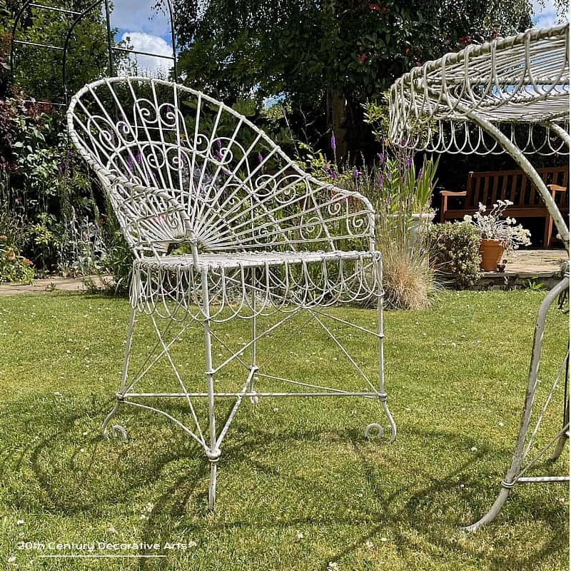  Wirework Garden Set comprising of a round table and two chairs, late 20thC 