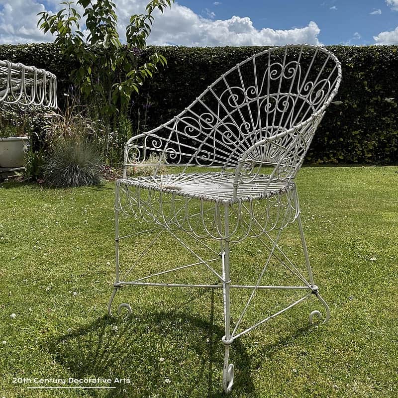  Wirework Garden Set comprising of a round table and two chairs, late 20thC 