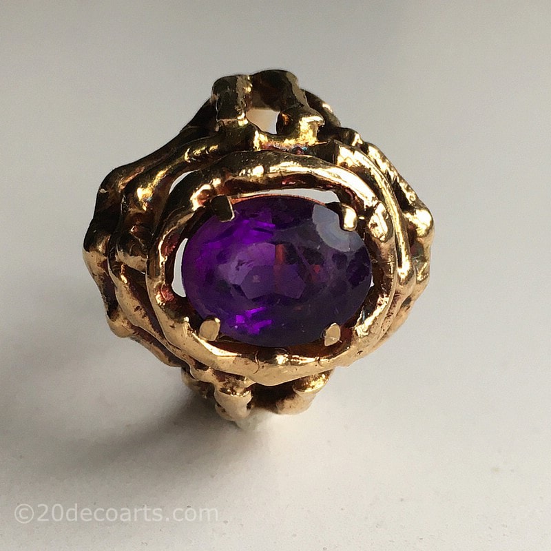 A 1970’s Design 9ct gold and amethyst ring with organic openwork setting, approx 8g 