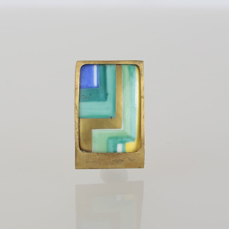  20th Century Decorative Arts |An Art Deco gilded bronze and porcelain brooch in the style of Kurt Wendler for Rosenthal, Germany c1920. 