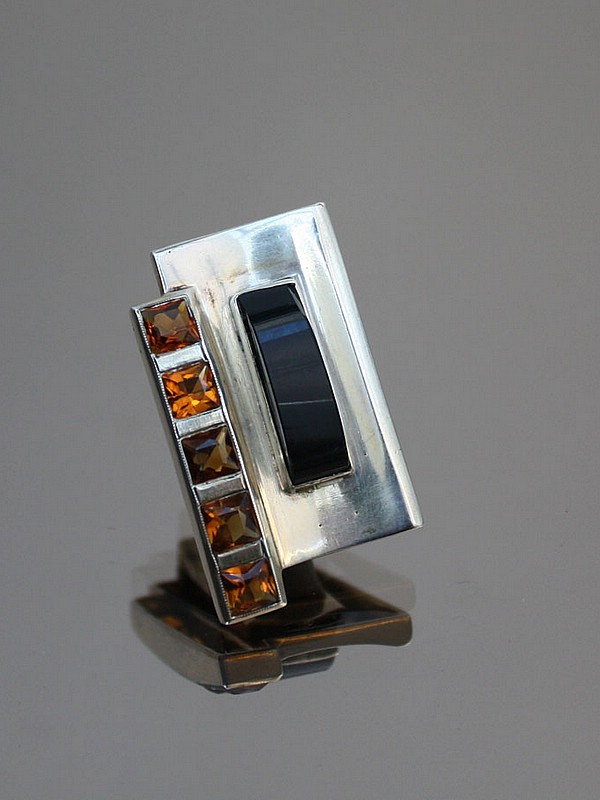  20th Century Decorative Arts |A beautiful Art Deco 935 silver modernist dress clip, 
set with black onyx and citrines, Germany c1930's