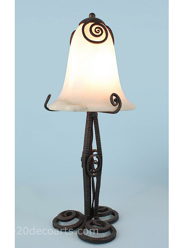 20th Century Decorative Arts | A stylish Art Deco iron and alabaster table lamp in the style of Edgar Brandt France 1920s the hammered base with the original shade