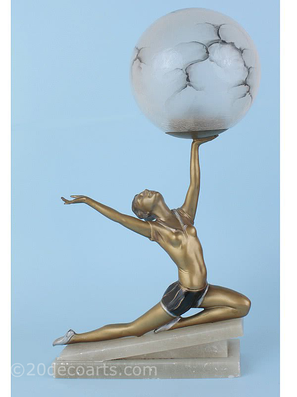  20th Century Decorative Arts |An Art Deco metal and original glass globe lamp Germany 1930s, after a design by Preiss the gold cold-painted metal maiden supporting the "alabaster" shade, mounted on an alabaster base