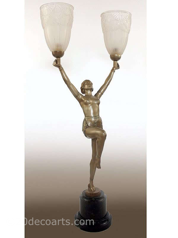  20th Century Decorative Arts |An impressive Art Deco metal and glass lamp Germany 1930s the cold-painted metal maiden holding aloft two original molded glass shades mounted on a black granite base 