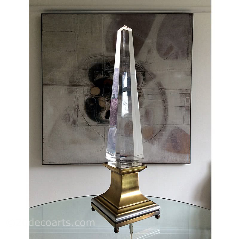  20th Century Decorative Arts |Maison Jansen Obelisk Lamp designed by Sandro Petti c1970's The metal base in a brass and silvered finish fitted with two small fluorescent tubes supporting a lucite ( perspex ) obelisk.