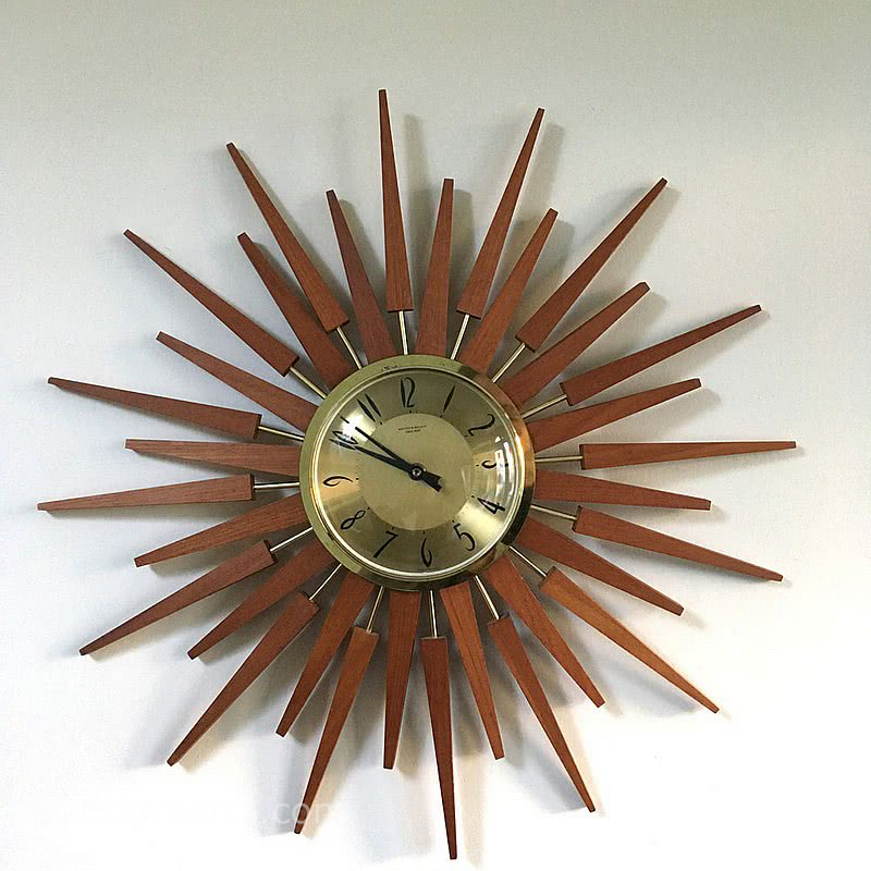  20th Century Decorative Arts |An iconic Anstey & Wilson teak and brass Sunburst / Starburst Wall clock 1970s.