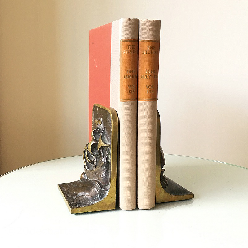  Art Deco Bronze Bookends c1930’s, the lacquered bronze patinated and polished, each featuring galleons at sea in full sail 