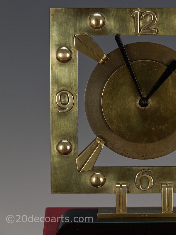 WModernist Art Deco Clock by Bayard, France circa 1930, made of bronze and brass, mounted on black marble.