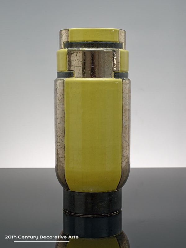  20th Century Decorative Arts |An Art Deco glazed earthenware cubist style vase, France c1930, the body decorated in black yellow and silver decoration