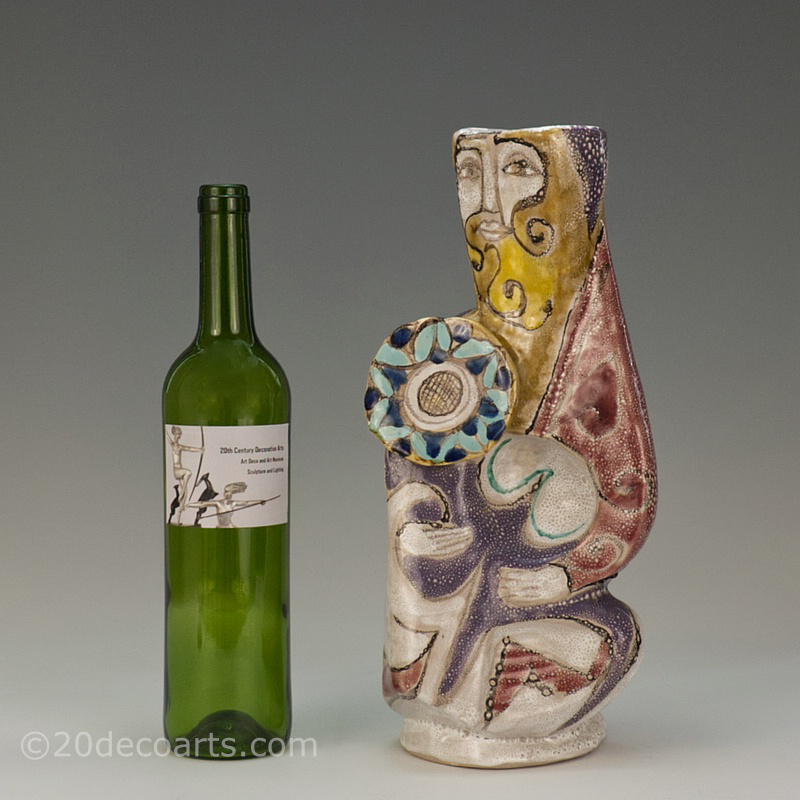  20th Century Decorative Arts |A large Elio Schiavon hi-glaze figurative sculptural ceramic vase, "Guerriero", Italy circa 1960, the body decorated in enamels with applied disc