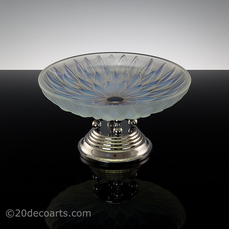  20th Century Decorative Arts |A stylish Art Deco opalescent glass table centrepiece, 1930s, by Etling of Paris, the satin and polished glass molded with a stylised flower head, mounted on a modernist chromed metal base