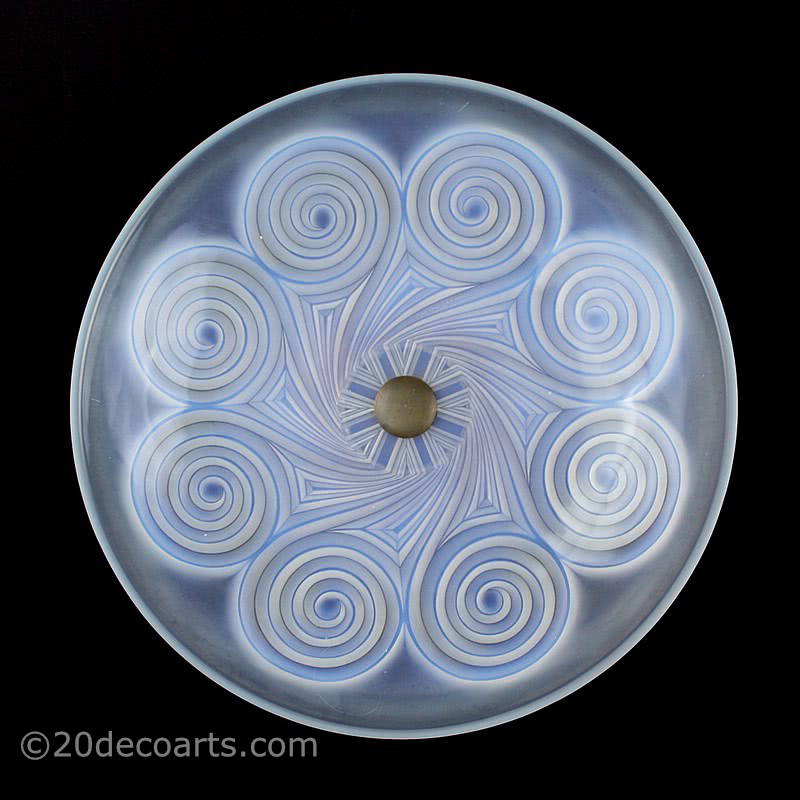  20th Century Decorative Arts |A beautiful Art Deco opalescent glass table centrepiece, 1930s, by Etling of Paris , the satin and polished glass molded with a stylised swirls, mounted on a patinated brass scroll design base