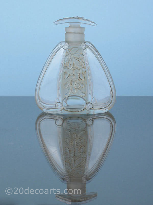  20th Century Decorative Arts |A lovely Art Deco molded glass scent bottle, the satin and polished glass molded with a stylised foliage, France 1920s