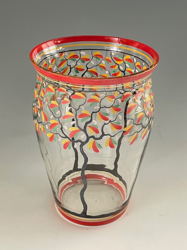   J van Kooten (attributed) An Art Deco Enamelled Glass Vase c1930 - the clear glass vase hand painted with a stylised band of trees in black, red, green and white enamel.    