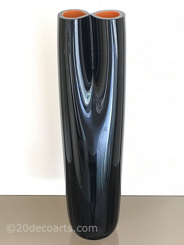 Jan Exnar, Skrdlovice - A tall sculptural vase in black glass over an orange glass lining