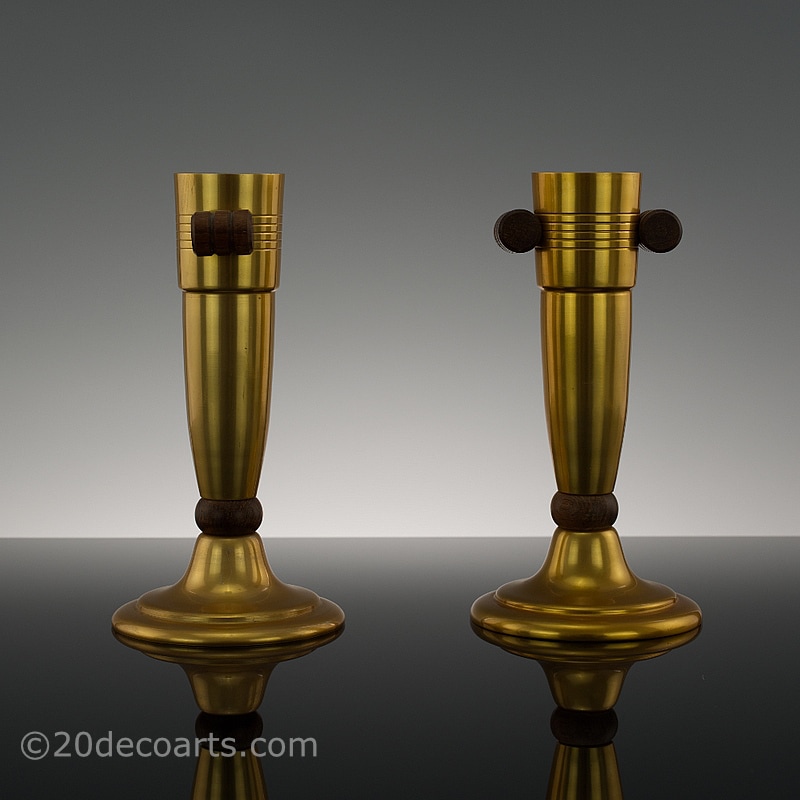  20th Century Decorative Arts |A pair of stylish Art Deco gilded aluminium and palisander wood vases, France, 1930s.