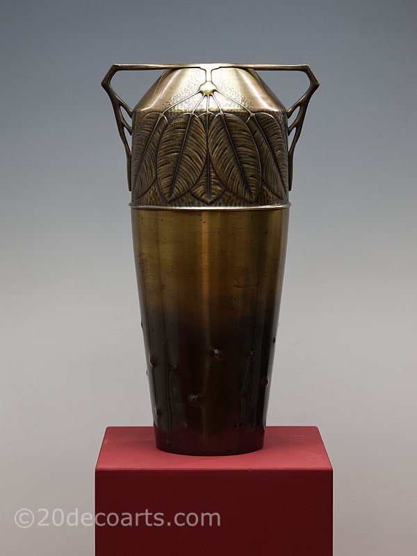 WMF - an impressive Jugendstil Art Nouveau vase, Germany circa 1900, the patinated brass vase cast with vegetation