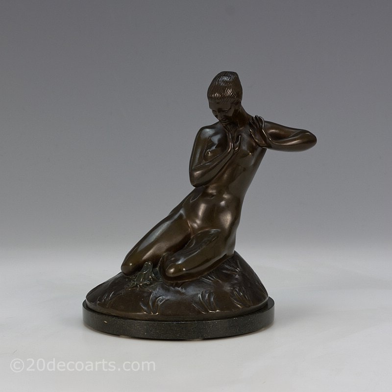 Carl Neuhaus - An Art Deco sculpture The Surprise, Germany, dated 1921 - the young woman with a frog at her knees 