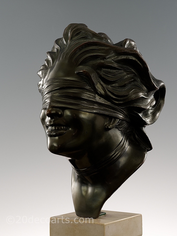  P. Uccello, a metal sculpture bust Lady Justice, first half 20th century - the smiling blindfolded young woman made of patinated metal 