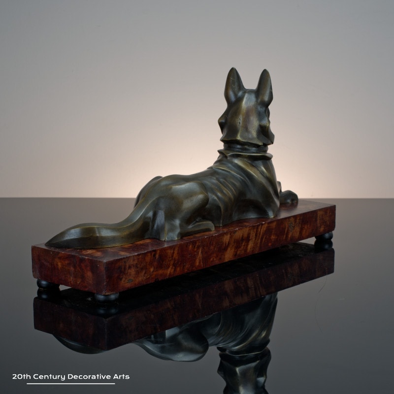 H Petrilly - A stylish Art Deco patinated bronze sculpture of a German Shepherd dog