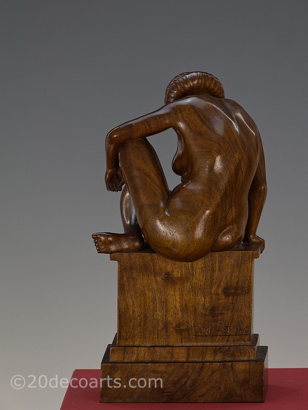  L. M. Cabanac- An Art Deco carved wood study of a female nude sculpture