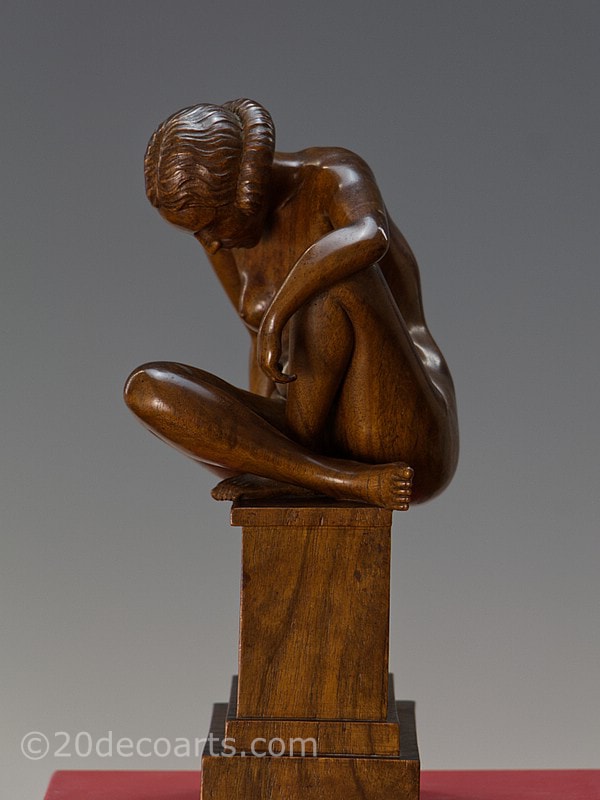  L. M. Cabanac- An Art Deco carved wood study of a female nude sculpture