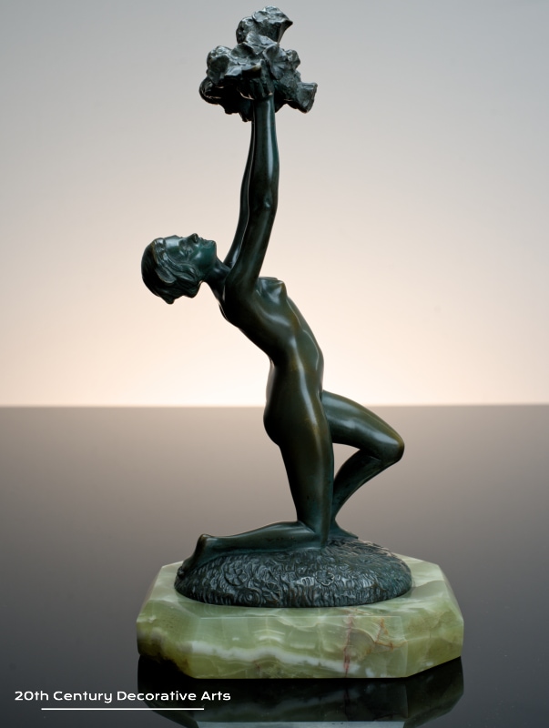   Art Deco bronze sculpture for sale circa 1930 the nude dancer holding aloft an abundance of flowers