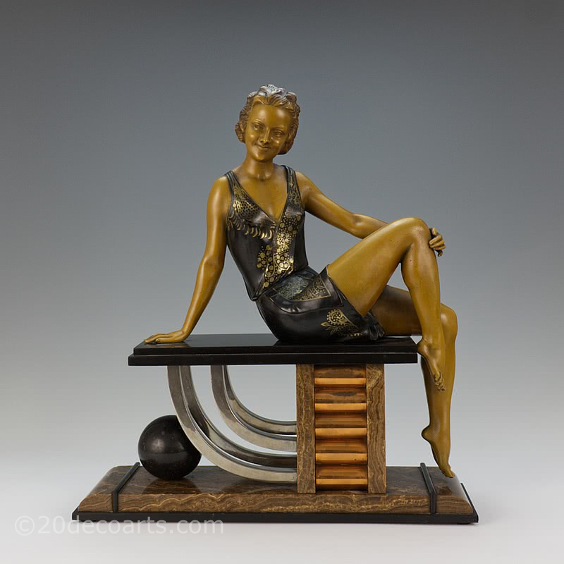  20th Century Decorative Arts | A large Art Deco spelter figurine by Enrique Molins-Balleste,
                sat on a desk