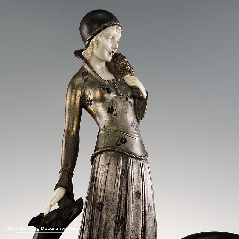 Demétre Chiparus - An Art Deco sculpture, France circa 1925 Maiden with Hounds, the young woman walking with her greyhounds