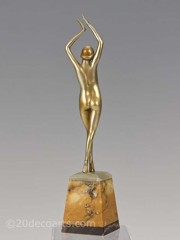  20th Century Decorative Arts | A stylised Art Deco bronze figure by Devriez, France circa 1920s depicting a dancer with a gold cold-painted and enamelled finish, mounted on tri-coloured marble base
