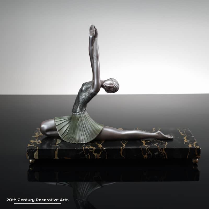  Ganu Gantcheff - A rare Art Deco cold-painted bronze sculpture, France circa 1930, the stylised dancer mounted on a portoro marble base