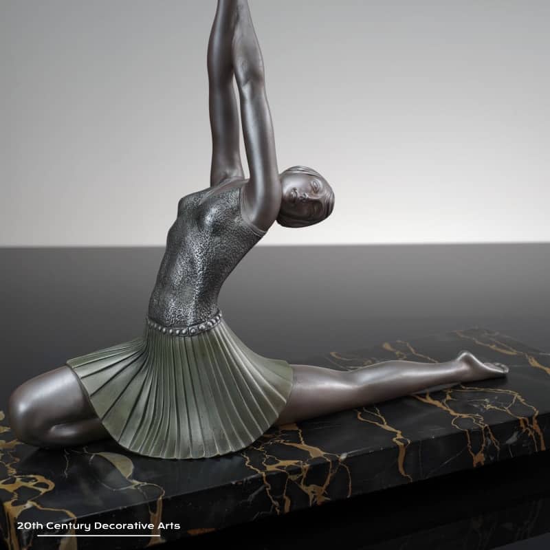  Ganu Gantcheff - A rare Art Deco cold-painted bronze sculpture, France circa 1930, the stylised dancer mounted on a portoro marble base