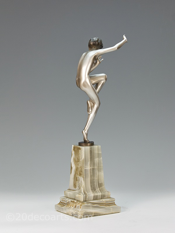 Josef Lorenzl - A fine Art Deco bronze figure, Vienna Austria circa 1930 depicting a silvered and lacquered dancing young woman