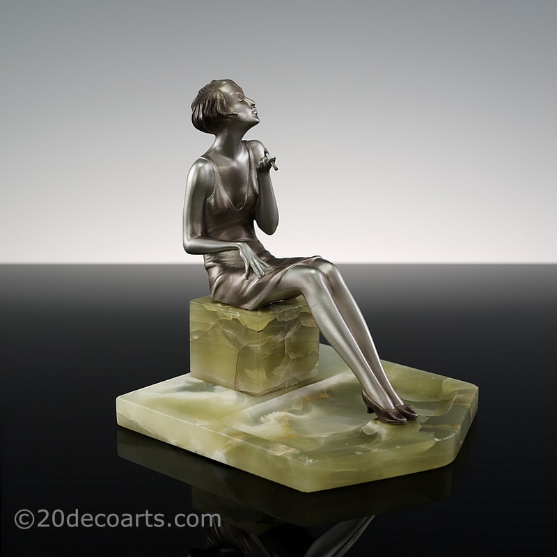   Josef Lorenzl - An Art Deco bronze figurine, Austria circa 1930, the modern miss smoking a cigarette 3 