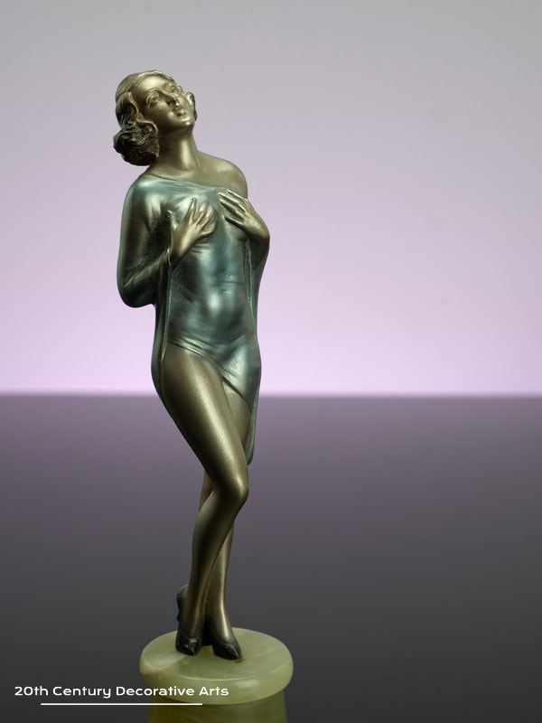   Josef Lorenzl - Art Deco bronze figure circa 1930 - depicting a young woman with her hands clasped to her breasts 