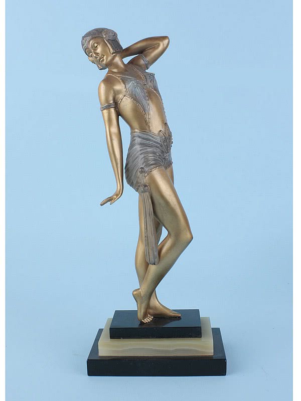  20th Century Decorative Arts |A lovely Art Deco spelter figure by A Leclerc, France c1930,  the gold cold-painted figure mounted on a black marble and green onyx base
