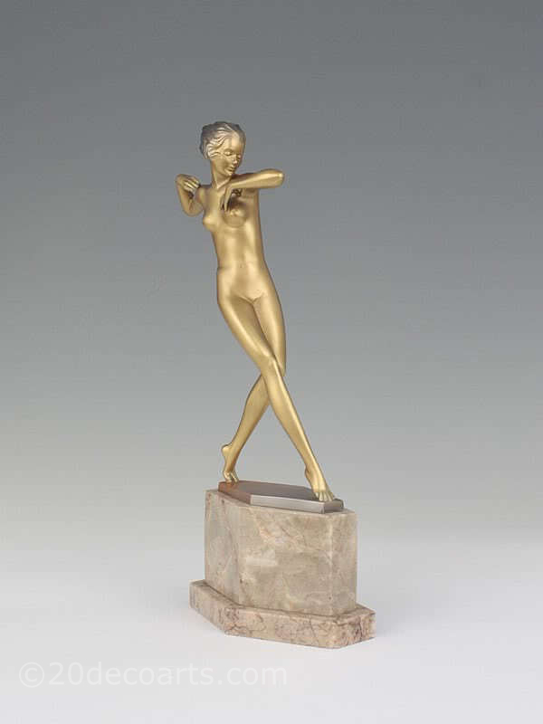 Josef Lorenzl - An Art Deco bronze figure, Austria circa 1930, the large bronze dancer with a gold and enamelled finish