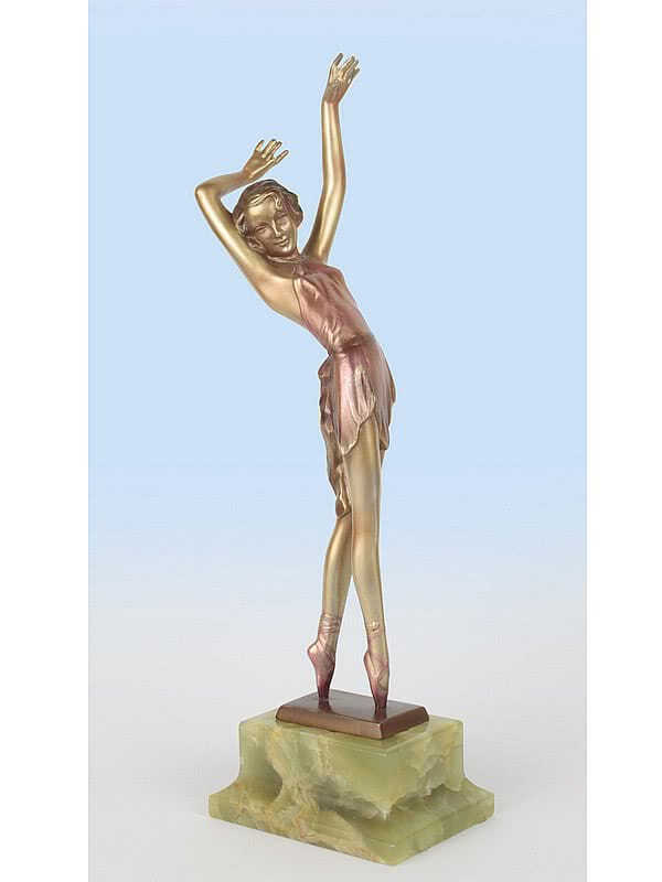  20th Century Decorative Arts | A beautiful Art Deco bronze figure by Josef Lorenzl,  Vienna Austria circa 1930 the ballet dancer en pointe, the gold lacquered cold-painted bronze with enamel details, mounted on a shaped onyx base