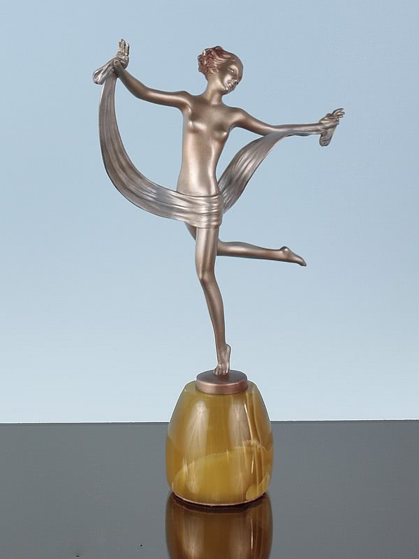 20th Century Decorative Arts | An Art Deco Austrian bronze figure by Josef Lorenzl, circa 1930s depicting a dancer with drape and a silvered and enamelled cold-painted finish