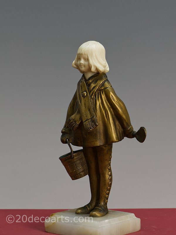  Solange Bertrand- An art deco  bronze and ivory figurine, France circa
              1925,