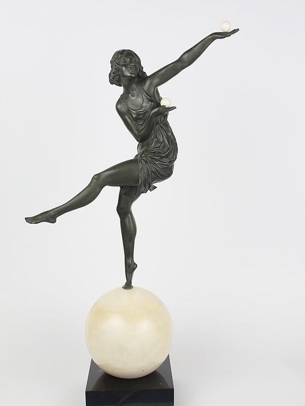  20th Century Decorative Arts |Marcel Andre Bouraine, an Art Deco bronze and ivory statue lamp, France 1930