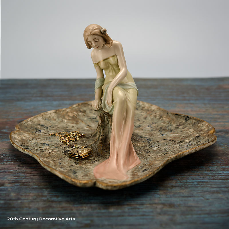 Ernst Wahliss, Turn-Teplitz, Bohemia 1900 -  A porcelain card tray featuring a young woman