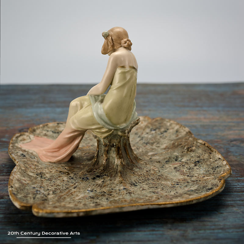 Ernst Wahliss, Turn-Teplitz, Bohemia 1900 -  A porcelain card tray featuring a young woman